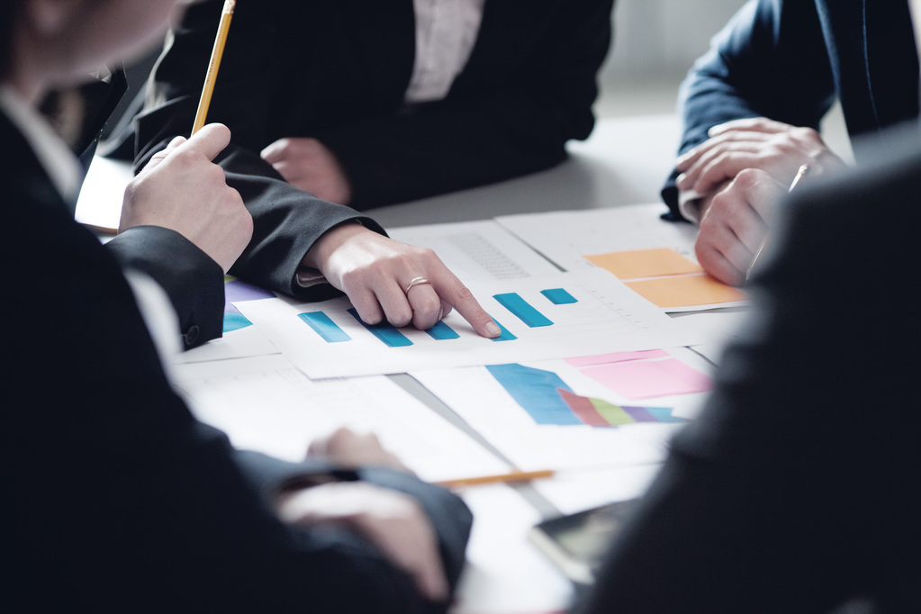 Business team with reports